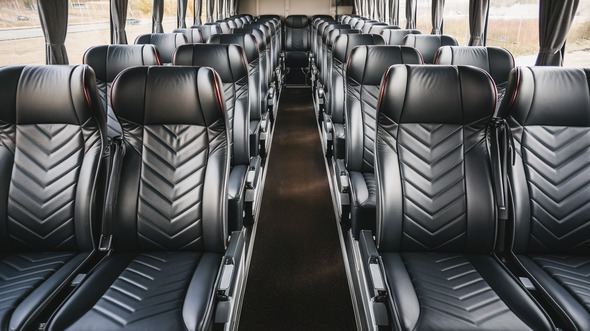 56 passenger charter bus inside port arthur